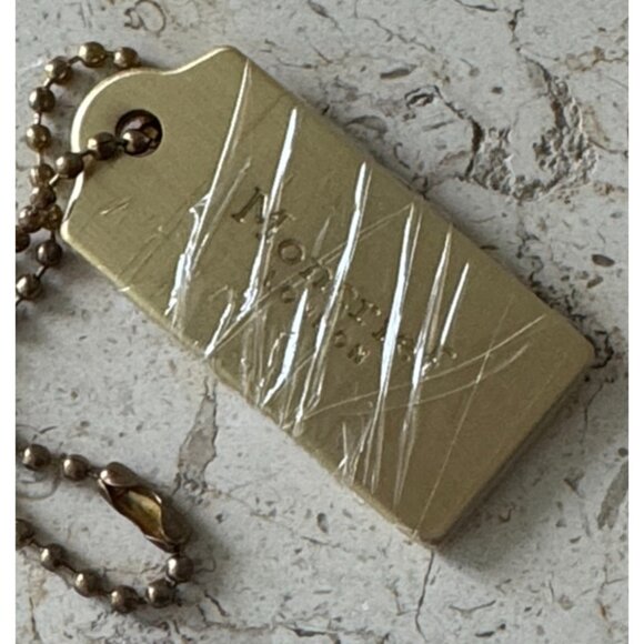 MONCRIEF London Handbag Hang Tag Charm Brushed Gold Tone Metal 1-7/8" x 3/4" NEW - Picture 1 of 4